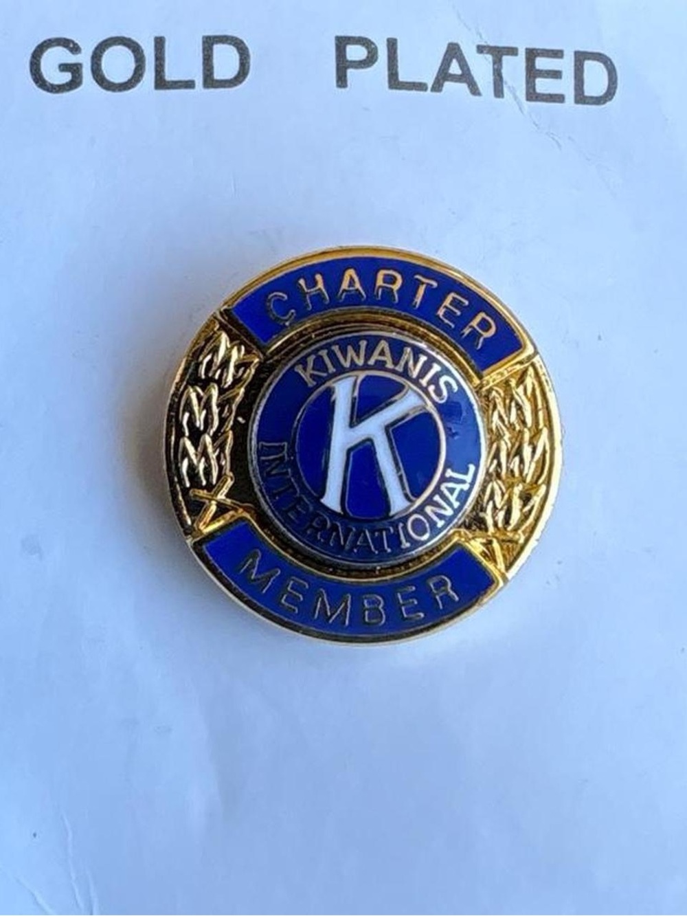 Vintage gold-plated Kiwanis International charter member lapel tack pin blue